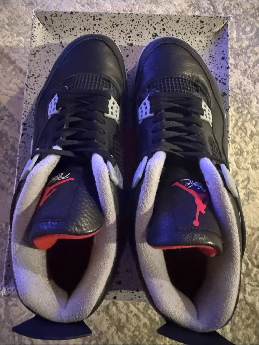 Jordan 4 Retro Bred Reimagined- Black/Red Retro-Style Sneakers